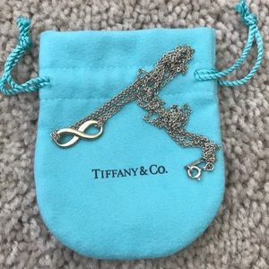 Tiffany’s infinity necklace, dust bag included.